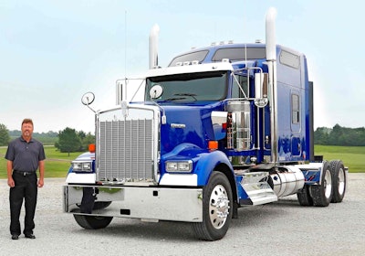 Stan Keim, president and owner of Keim TS, is shown with the first Kenworth ICON 900 delivered to a Kenworth customer. The truck, sold to the company by MHC Kenworth-Kansas City, was recently delivered to the company.