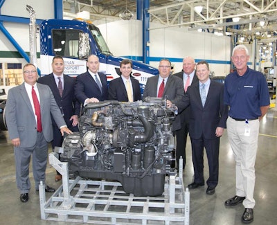 Representatives from AMG Peterbilt of Columbus, Kenan Advantage Group, PACCAR Engines and Peterbilt Motors Company celebrated the production of the 100,000th PACCAR MX-13 engine at the manufacturing facility in Columbus, Miss.
