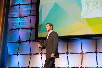 Brian McLaughlin, president of PeopleNet, speaks during the opening session of the conference on Monday, Tues., Aug. 25