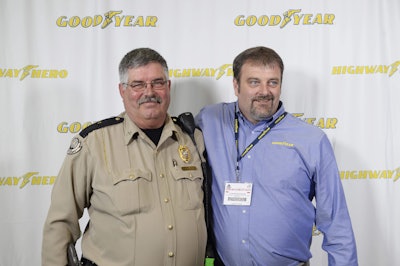 The 32nd Goodyear Highway Hero Award winner, Clinton Backburn, is shown with the law enforcement officer he rescued, Darrell Herndon.