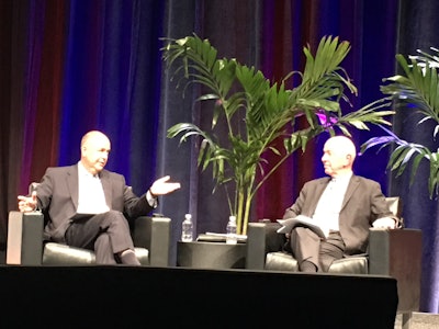 ATA chief economist Bob Costello (left) discusses the state of the economy with Nariman Behravesh, Ph.D., and chief economist for IHS.