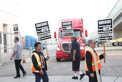 Port truckers have been striking at LA ports since July, charging they’ve been shorted pay and benefits due to their classification as contractors instead of employees.