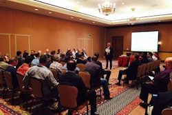 Moseley speaking at the 2015 CCJ Fall Symposium.