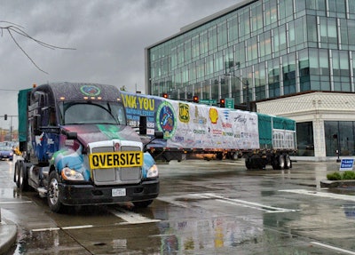 Lynden Transport driver John Schank makes a turn in the Belltown District of Seattle as it makes its way to Lake Union Park.