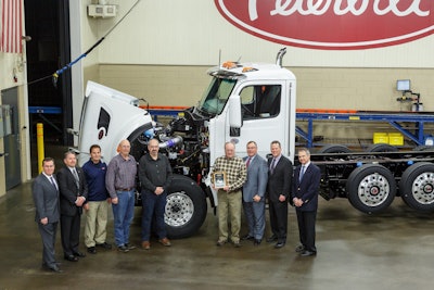 Charles Cook, marketing manager vocational products; Rick Paul, district sales manager; Ron Augustyn, Peterbilt Denton plant manager; Randy Kephart, Knife River equipment manager; Scott Hammond, Knife River northwest region equipment manager; Colin Milligan, Knife River shop manager; Robert Woodall, Peterbilt assistant general manager of sales and marketing; Leon Handt, Peterbilt assistant general manager of operations; and Jim Zito, director of sales vocational products.