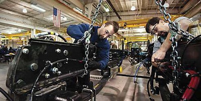 Frieghtliner’s largest truck plant in the U.S., located in Cleveland, N.C., issued layoff notices Monday to 936 employees, or one-third of its workforce.