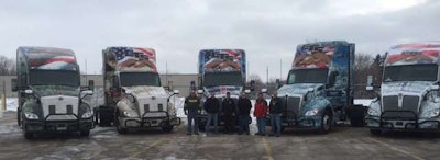CTS is honoring military veterans with trucks wrapped to honor each branch of the U.S. military. Shown are CTS’ veteran drivers and the wrapped trucks.