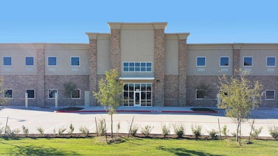 The KLLM Driving Academy in Lancaster, Texas, is a new two-story 44,000-square-foot school with modern classrooms and a residence hall.