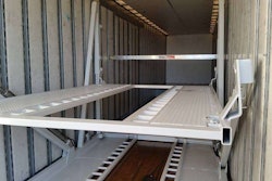 Shown is a module unit with both upper deck tracking and lower level tracking. Open bottom modules are also available in which the lower level vehicle tires park directly on the van floor.