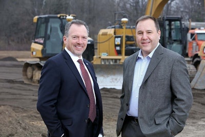 Daryl Adams, president & CEO, and Steve Guillaume, division president, specialty vehicles, at the site of Spartan Motors’ proposed new truck manufacturing plant.
