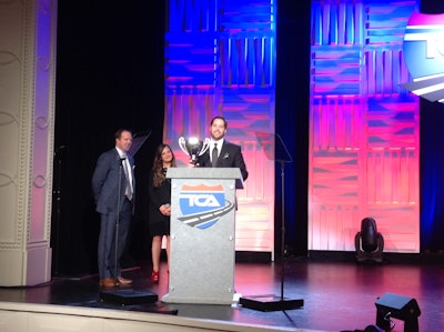 Josh Grimaldi, a driver for Prime, Inc., receives the Highway Angel award for rescuing a motorist.