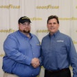 Julian Kaczor, left, being congratulated by Goodyear Marketing Director Gary Medalis.