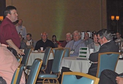 Frank Luntz asks the audience questions about presidential political candidates at the CCJ Spring Symposium in Birmingham, Ala.
