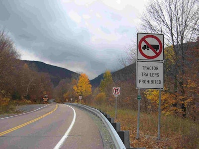 Signs entering Smugglers’ Notch indicate no trucks are allowed. (Photo courtesy Vermont Agency of Transportation)