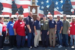 C.R. England added six drivers to its Honored Veterans Fleet and recognized World War II-era veteran Col. Gail S. Halvorsen, “The Berlin Candy Bomber,” as the first recipient of the C.R. England Honored Veteran Award. Pictured left to right: Katie Freisen, Senior Director of Global Distribution and Transportation for The Hersey Company; drivers Mark Evans, Robert St. John, and Brian Walk; Dan England, C.R England Chairman; Halvorsen; Gene England, C.R. England President Emeritus; and drivers Tim Williams, Leland Boyles and Dennis Hallowell. (PRNewsFoto/C.R. England, Inc.)