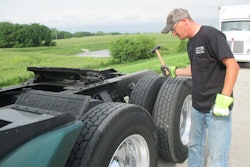 Waller Lease Driver Dave Swenson performs a pre-trip inspection.