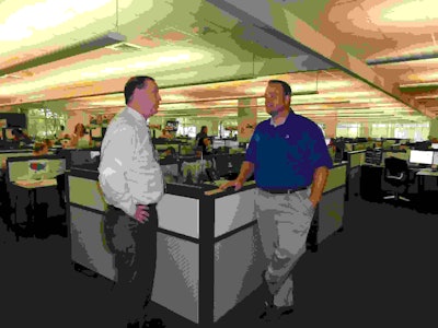 Richard Cribbs, CFO, and Doug Schrier, VP of continuous improvement, on the operations floor of CTG in Chattanooga, Tenn.