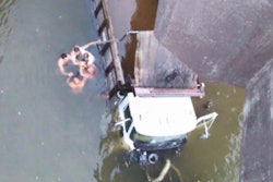 A deadly collision involving two dump trucks sent both trucks plummeting from a bridge near Covington, Ga. into the Yellow River. A group of men shown above were not able to rescue one of the drivers who was underwater, pinned under his truck. (Photo Tweeted by CBS46)