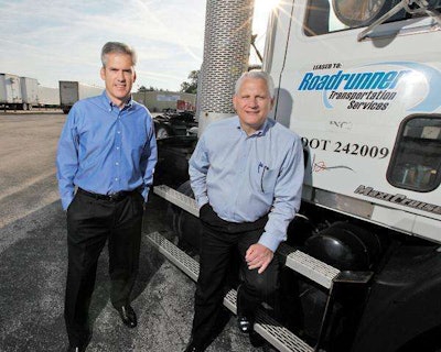 Roadrunner Transportation Systems’ Peter Armbruster, chief financial officer, left, and Mark DiBlasi, CEO, are firsthand witnesses to the company’s rapid growth.