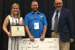 Trucking’s Top Rookie Christopher Crowell poses with TCA’s Marli Riggs (left) and Truckers News Editor David Hollis.