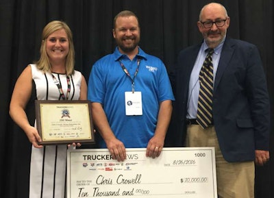 Trucking’s Top Rookie Christopher Crowell poses with TCA’s Marli Riggs (left) and Truckers News Editor David Hollis.