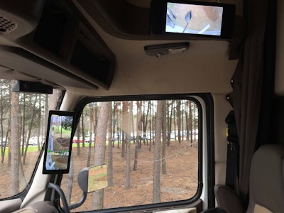 Two screens mounted on the passenger side allow the driver to see down the trailer’s side and in the truck’s blind spot. SuperTruck also features two traditional pillar-mounted mirrors as required by law.