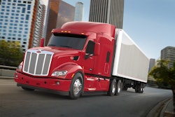 Semi truck driving through a city