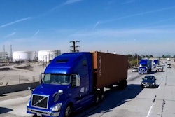 Three Volvo VNL 670 tractors hauled cargo containers from the Port of Los Angeles along Interstate 110 in Southern California.