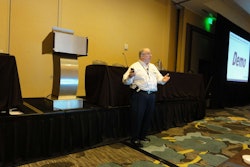 Bob Hausler, vice president of technology and marketing for Dossier Systems, speaks at the opening day of the user conference on April 19