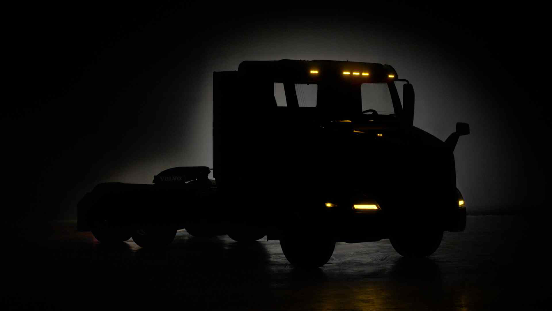 Volvo truck parked in the dark