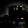 Volvo truck parked in the dark
