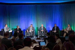 ACT Expo panel discussion on The Future of Heavy Duty Trucking. From left to right: Kary Schaefer, Daimler; Steve Gilligan, Navistar; Brian Lindgren, Kenworth; Jonathan Randall, Mack; and Bill Kahn, Peterbilt.