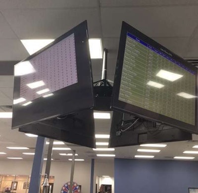 A Jumbotron in the office of ReedTMS Logistics gives everyone a real-time scorecard of performance metrics.