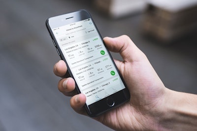 Man Using Trucker Path Mobile App