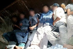 Illegal immigrants shown here in the back of a dump truck were recently arrested for trying to unlawfully enter the U.S. from Mexico. (Photo: U.S. Customs and Border Protection.)