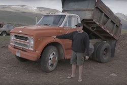 Roadkill host David Freiburger stands nexts to a 1969 Chevy C50 dump truck.