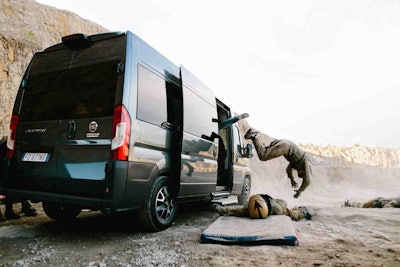 Chuck at work booting a bad guy out of an FCA van.