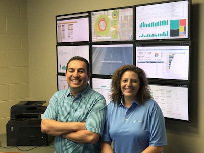 Mauricio Paredes, vice president of technology, and Tiffany Giekes, director of business process, for PS Logistics are rolling out business intelligence to all users.