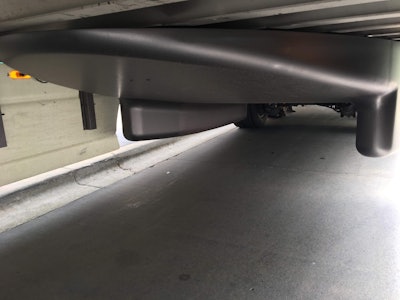 A full-width reinforced carbon-fiber bogie treatment acts like a boat’s hull under the trailer, separating the airflow coming into the trailer axles.