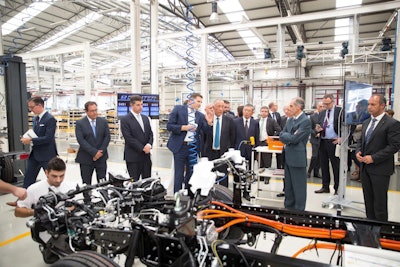 Marc Llistosella, president & CEO of Mitsubishi Fuso Truck & Bus Corporation, describes production requirements of the new eCanter to Marcelo Rebelo de Sousa, president of the Portuguese Republic.