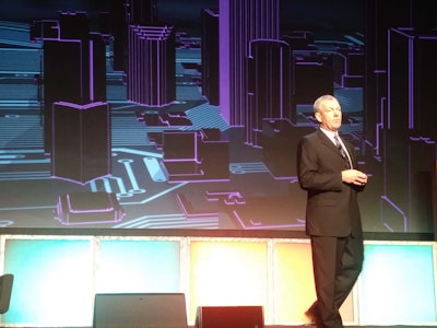 Ray West, senior vice president and general manager, TMS solutions for TMW, announces TruETA during the in.sight conference.