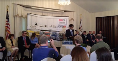 Hino Motors Manufacturing U.S.A. President Takashi Ono announces plans for the company’s new truck plant today in West Virginia.