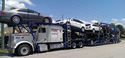 The Federal Highway Administration is considering expanding the definition of auto haulers to include high-mount tractor-trailers that are not able to haul vehicles on the tractor itself.