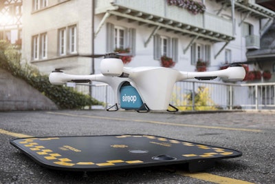 The drone equipped with a package from Siroop begins its journey.