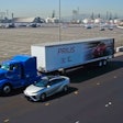 Toyota’s Project Portal hydrogen fuel cell semi next to the Toyota Mirai sedan, which is also powered by hydrogen.