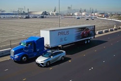 Toyota’s Project Portal hydrogen fuel cell semi next to the Toyota Mirai sedan, which is also powered by hydrogen.