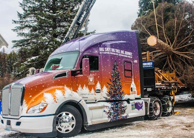 The 53rd U.S. Capitol Christmas Tree is loaded onto a custom-wrapped Kenworth T680 Advantage.