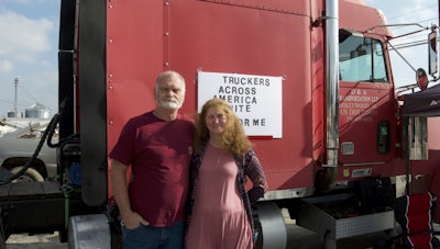 Darrell and Audrey Wright came out to protest the ELD mandate, which they say will cause unsafe driving and cost them revenue, in Hollywood, Ala. Their 2000 Freightliner Classic is one of three trucks they own. Darrell bought it to try and evade the ELD mandate, but his truck doesn’t qualify for an exemption.