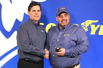 Frank Vieira (right) was named the 35th annual Goodyear Highway Hero on Thursday at the Mid-America Trucking Show for his life-saving effort after witnessing a crash. He is shown with Gary Medalis, marketing director for Goodyear.