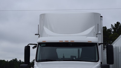 Vehicle to vehicle communication takes place via small antennas mounted atop the trucks’ hood and transponders mounted above the bumper.